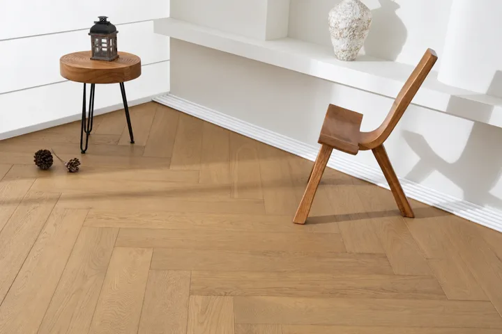 Latte Tan Herringbone · Retouched herringbone sample photograph